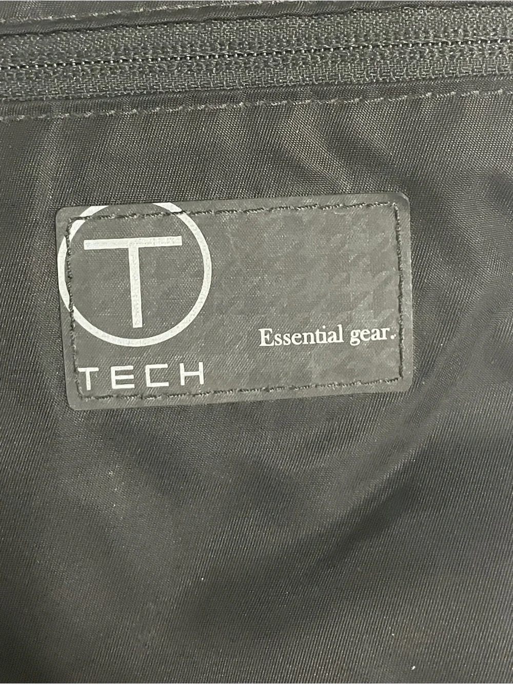 Tumi Black Messenger Bag with Red Interior